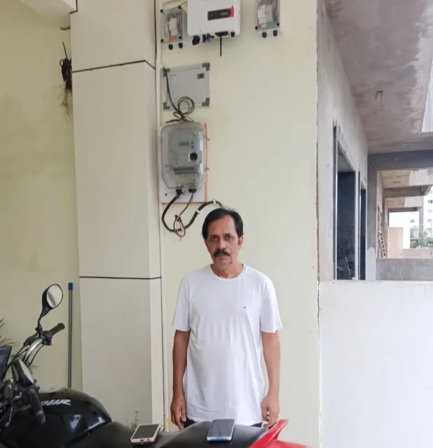 Devendra Kumar Shrivastava with the 3 kW rooftop system