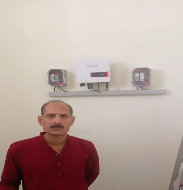 Mangesh Dawande with the 3 kW rooftop system