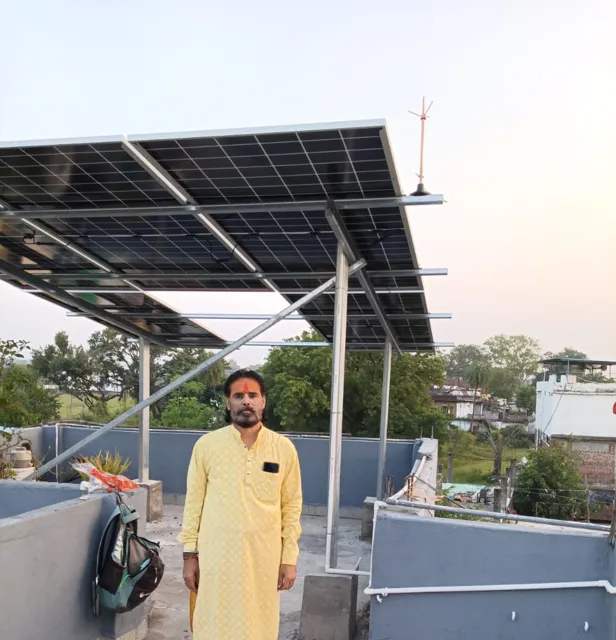 Rajkumar Joshi with the 3.1 kW rooftop system