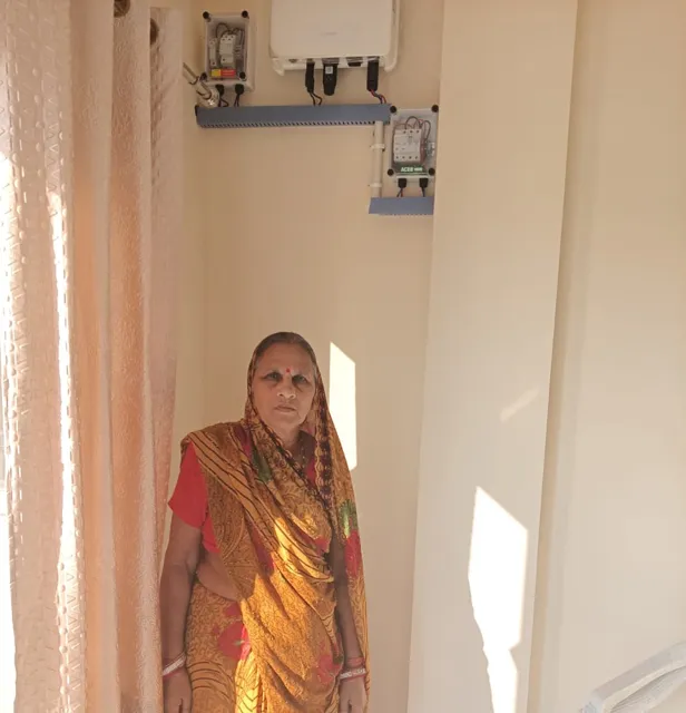 Smt Prabha Yadav with the 3.3 kW rooftop system