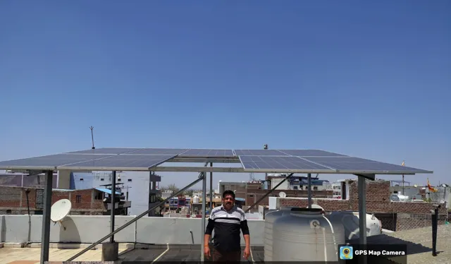 Sudheer Bhargava with the 5 kW rooftop system